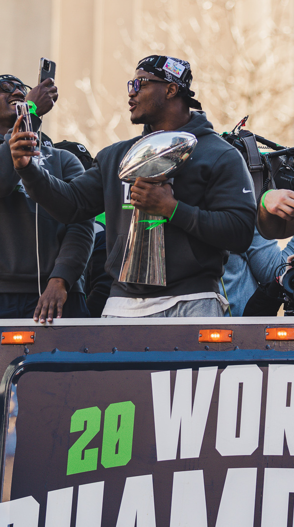 1789481525764_Kenneth_Walker_III_Lombardi_Trophy_Super_Bowl_LX_Victory_Parade_ 28cropped 29